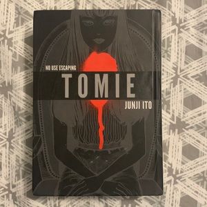 TOMIE Book, mint condition